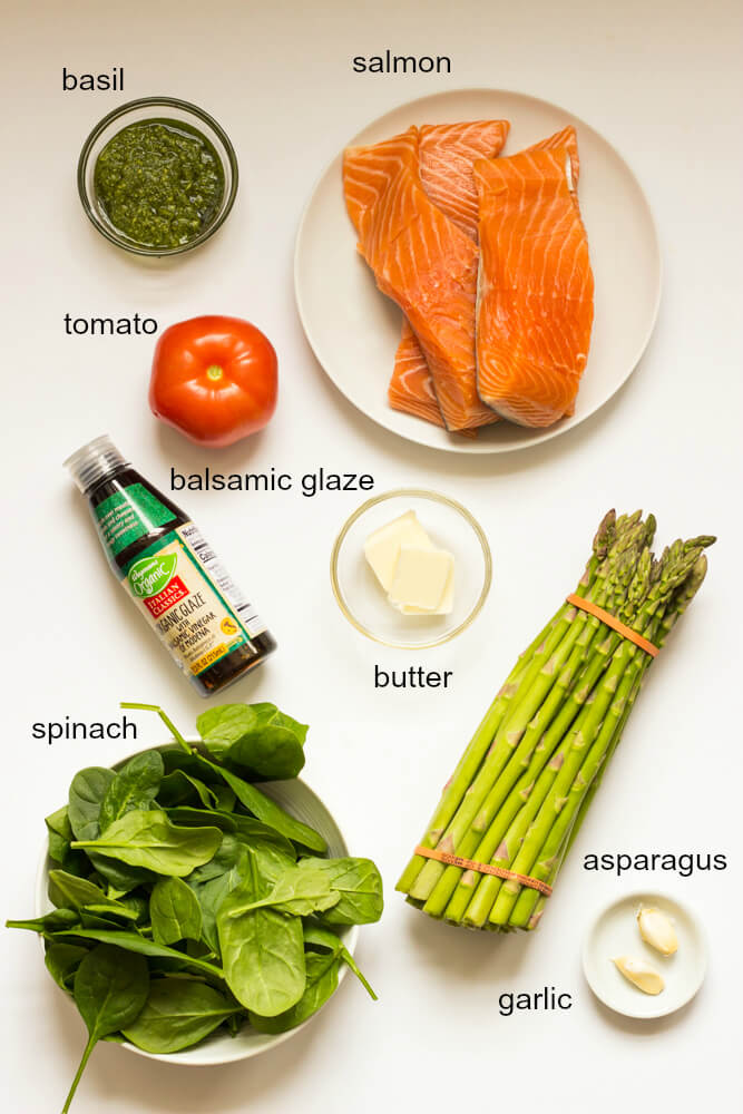 Baked Balsamic Salmon with Asparagus - perfect for date night in or company. This salmon dinner comes together in about 30 minutes | littlebroken.com @littlebroken