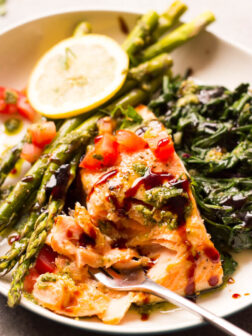 Baked Balsamic Salmon with Asparagus - perfect for date night in or company. This salmon dinner comes together in about 30 minutes | littlebroken.com @littlebroken