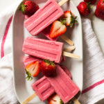 3-Ingredient Strawberry Yogurt Popsicles - creamy, fruity, and healthy! Fraction of the sugar and only 3-ingredients | littlebroken.com @littlebroken
