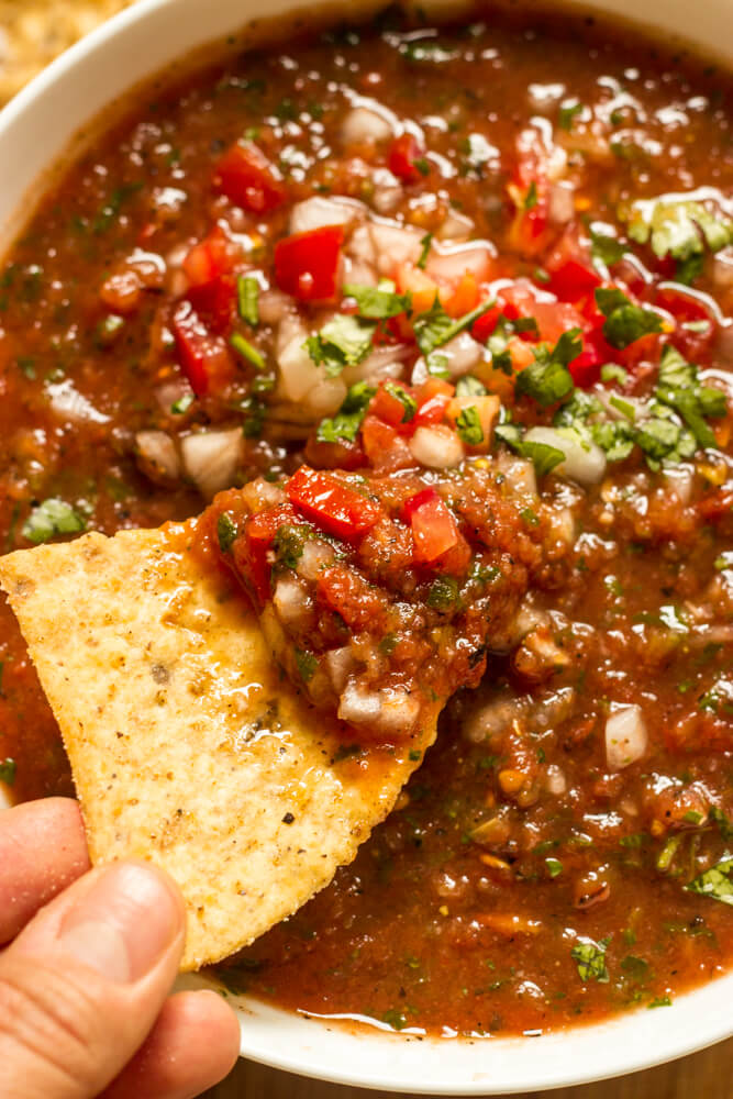 close up of roasted tomato salsa in white bowl