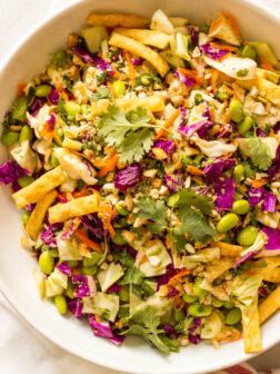 Crunchy Asian Chopped Salad - cabbage, edamame, cilantro, cashews, and insanely delicious sesame dressing! | littlebroken.com @littlebroken