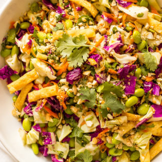 Crunchy Asian Chopped Salad - cabbage, edamame, cilantro, cashews, and insanely delicious sesame dressing! | littlebroken.com @littlebroken