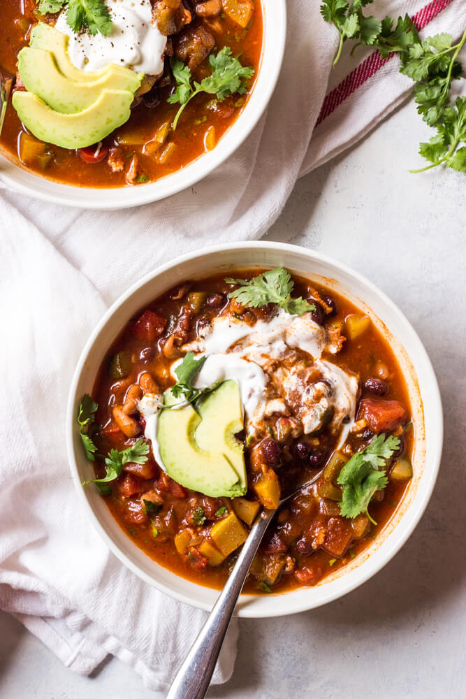 summer chili in a white bowl