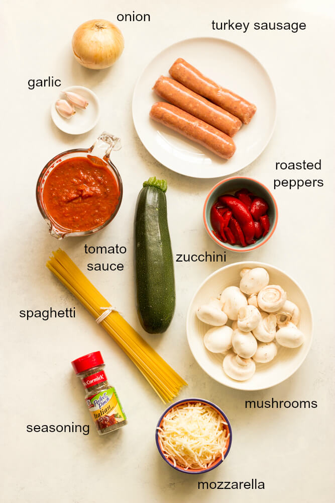 Overhead view of ingredients for spaghetti zucchini bake