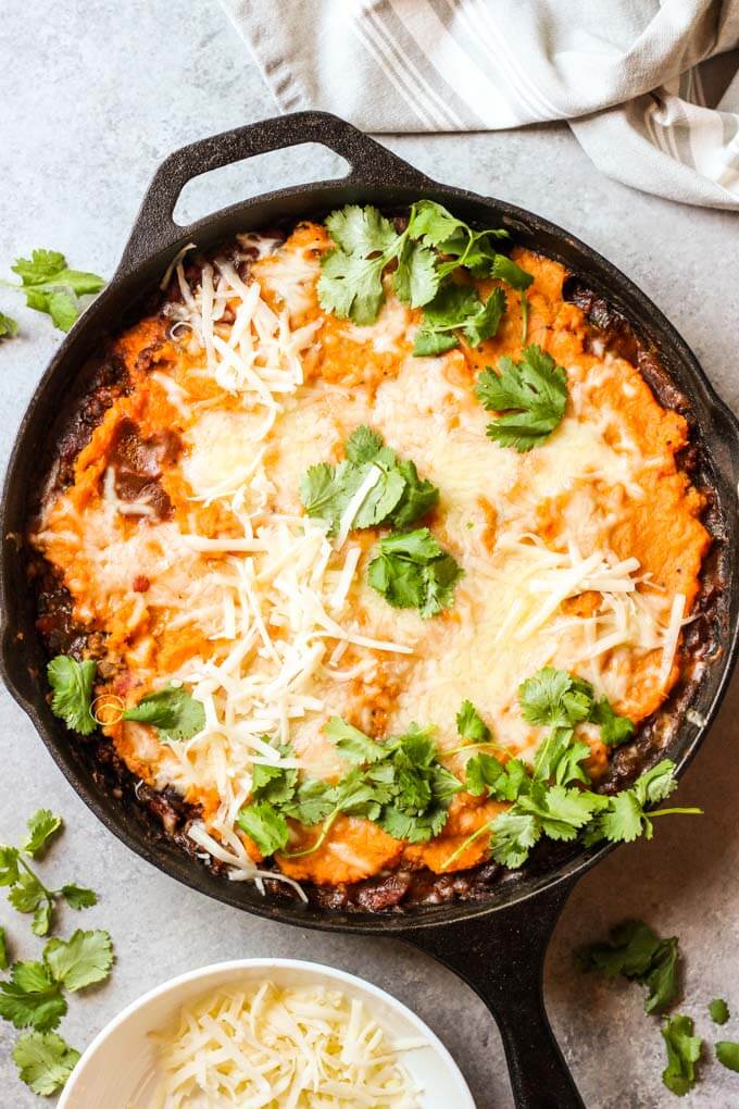 Overview turkey sweet potato shepherd's pie in black cast iron skillet