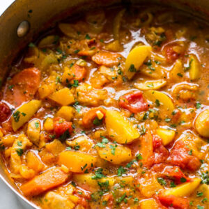Overhead shot of chicken stew in a dutch-oven