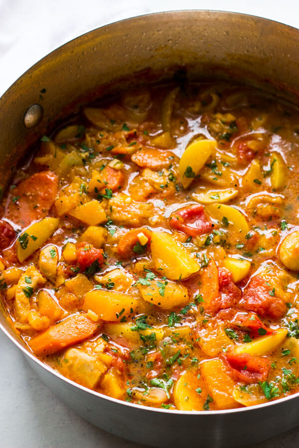 Overhead shot of chicken stew in a dutch-oven.