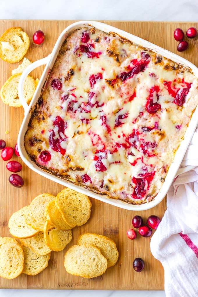 Cranberry dip in white baking dish.