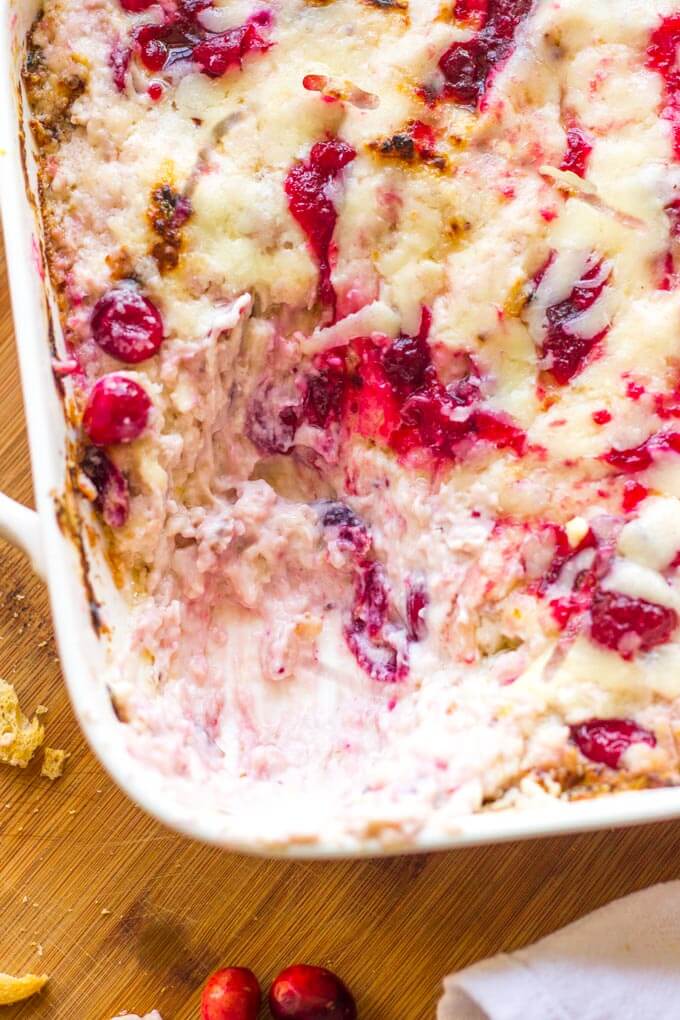 Close up of cranberry dip in white baking dish.