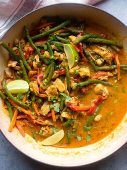 Close up easy chicken vegetable curry in white saute pan