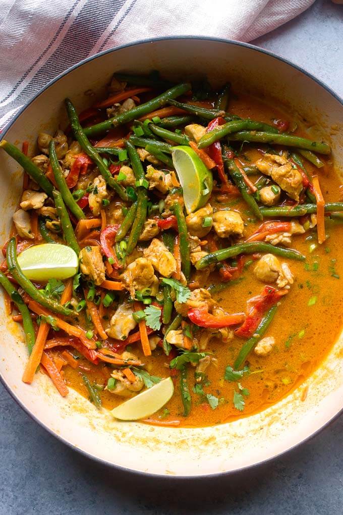 Close up easy chicken vegetable curry in white saute pan