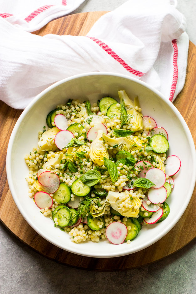 Overhead pearl couscous salad with spring vegetables