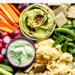 Close up raw vegetables on wooden board