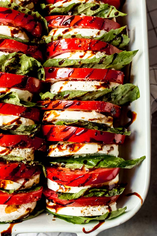 Balsamic reduction drizzled over tomato mozzarella salad recipe