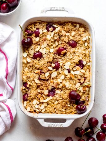 Overhead healthy oatmeal bake in white pan.