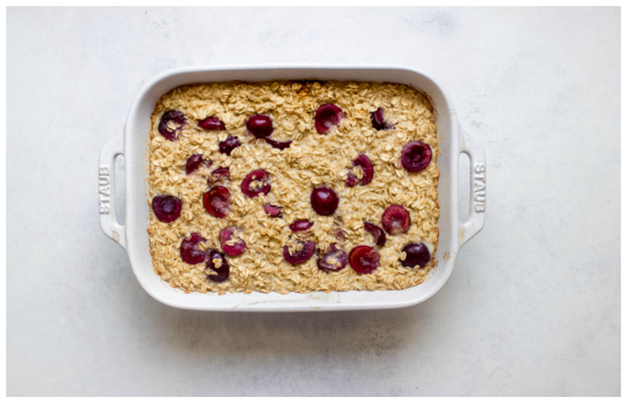 Baked oatmeal with cherries and milk