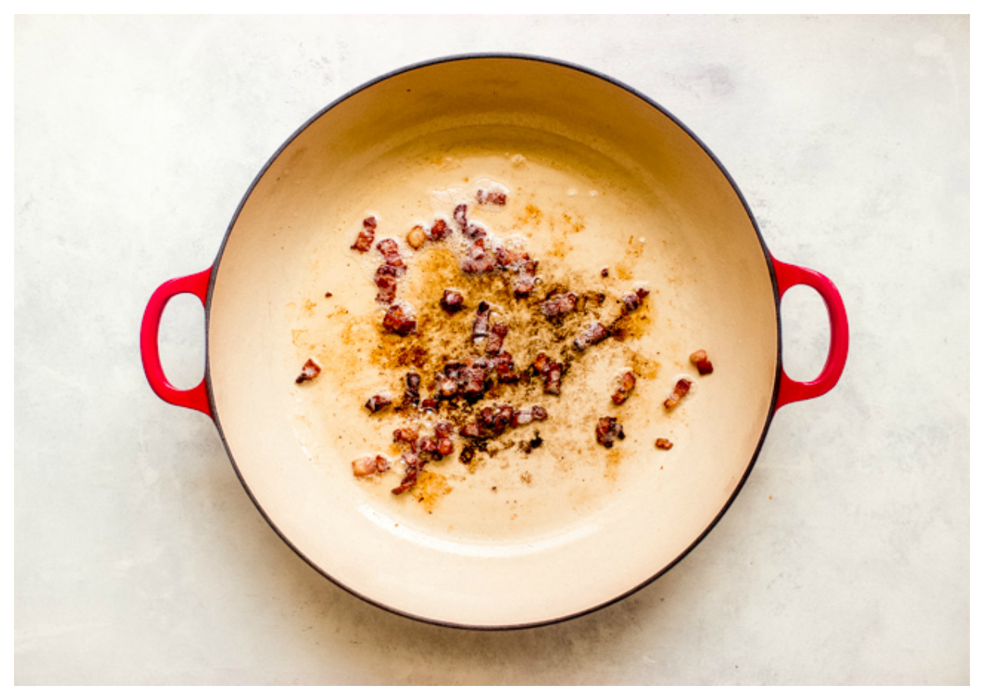 Cooked bacon in a skillet.
