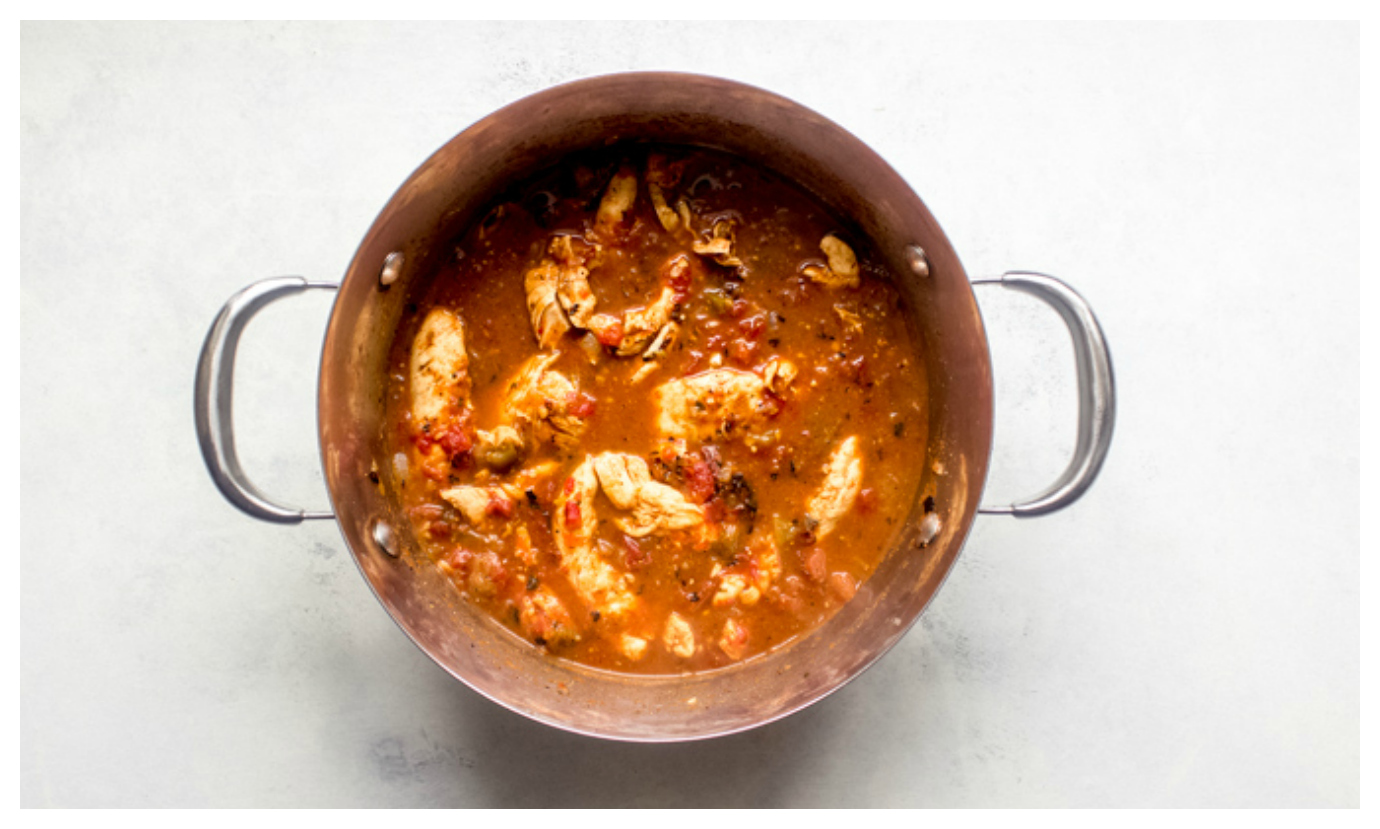 Overhead cooked chicken in a dutch oven