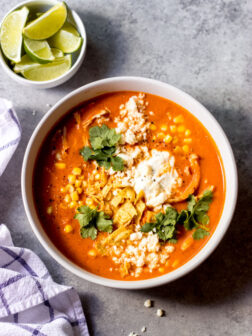 chicken tortilla soup in white bowl