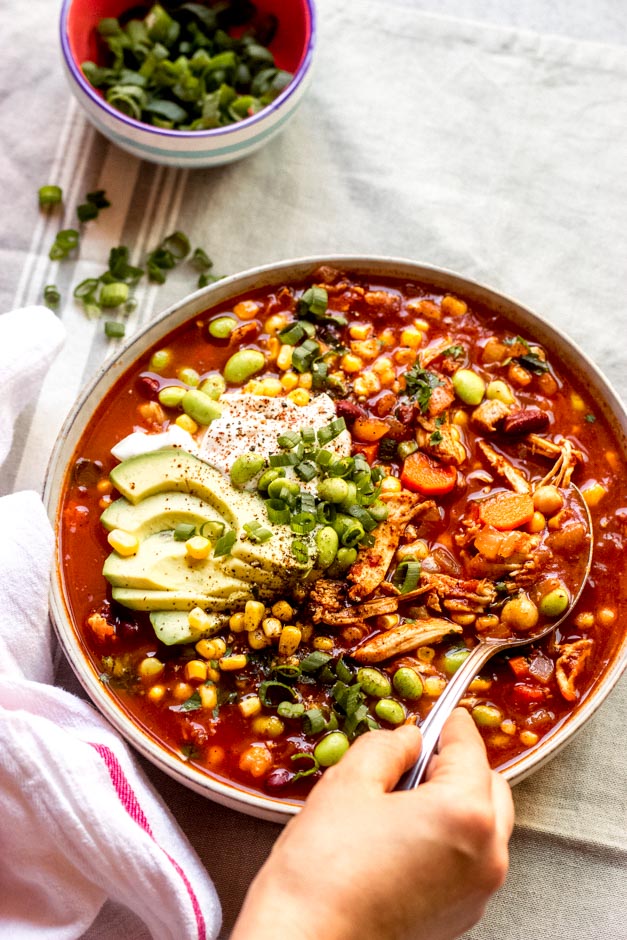 turkey meat chili recipe in white bowl.