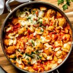 chicken meatballs with pasta in skillet