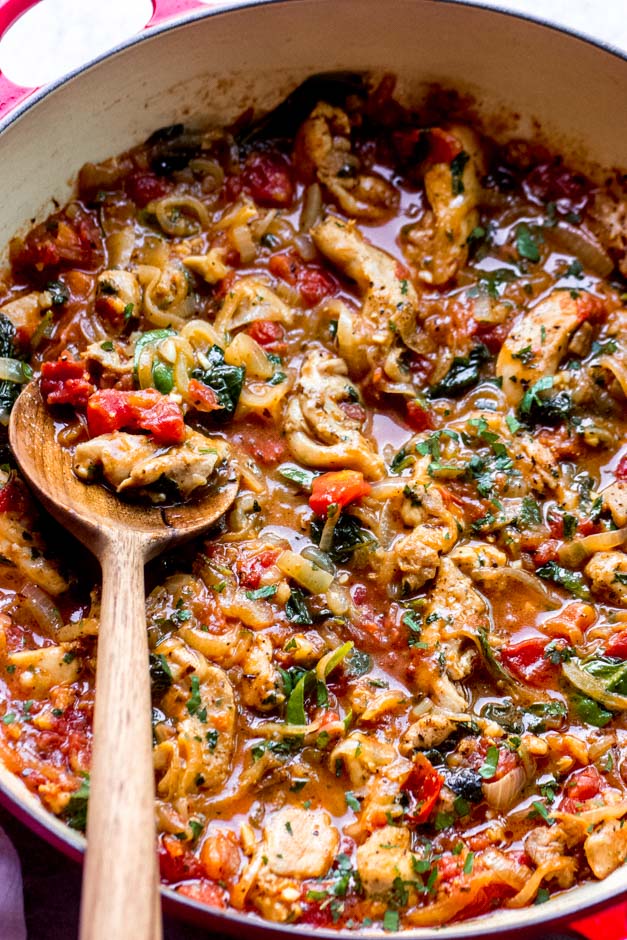 chicken with spinach and tomatoes.