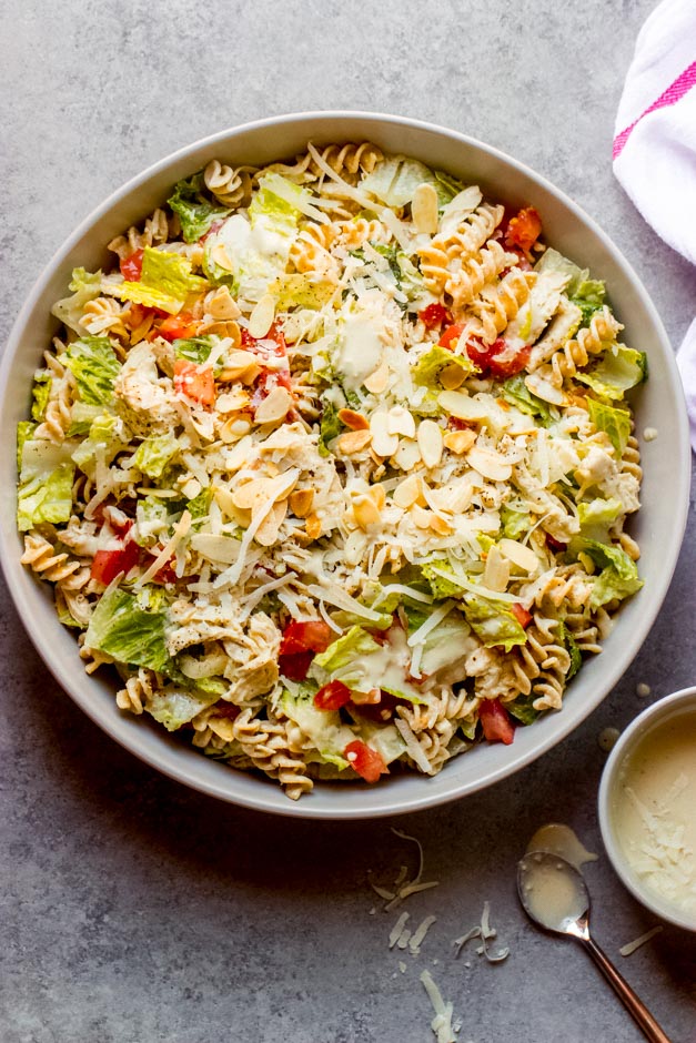 chicken caesar pasta salad in a bowl.