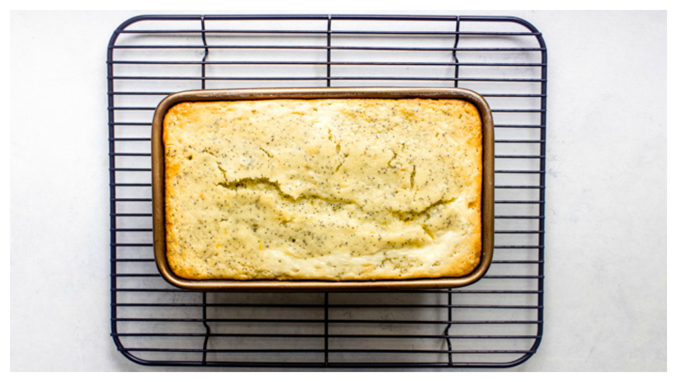 baked lemon cake on a cooling rack