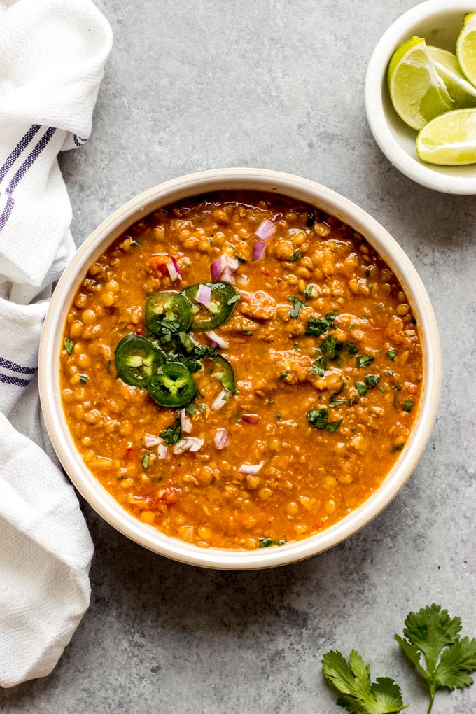 lentil chili in a white bowl