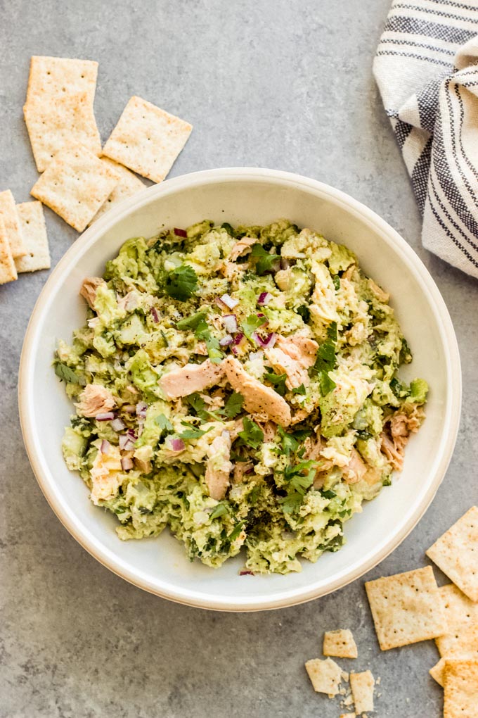 avocado tuna salad in white bowl.