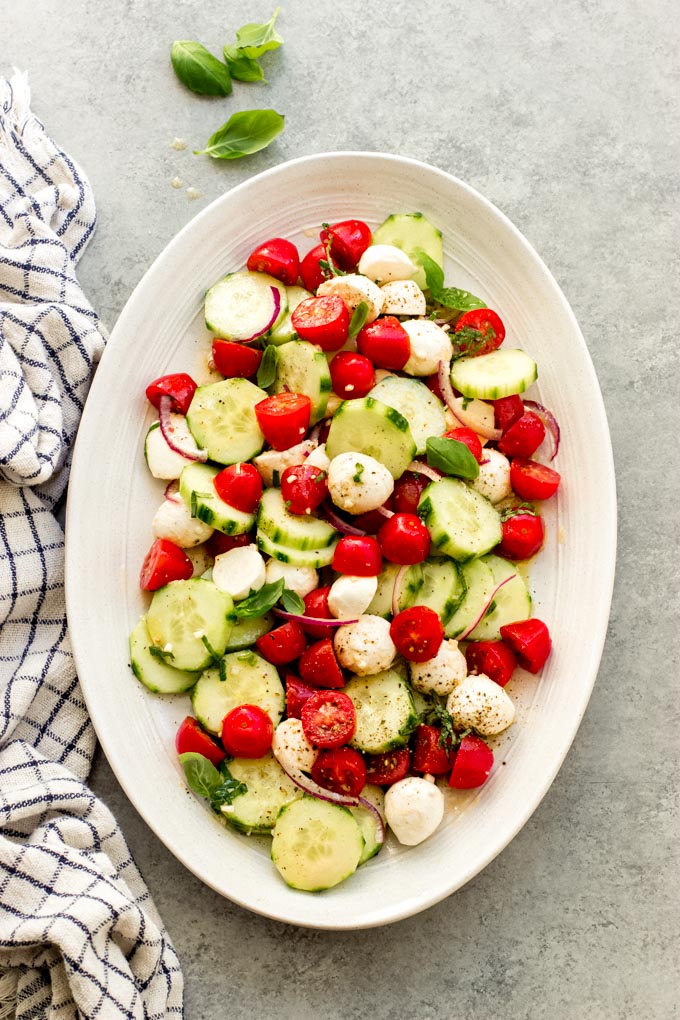 Tomato cucumber mozzarella salad little broken
