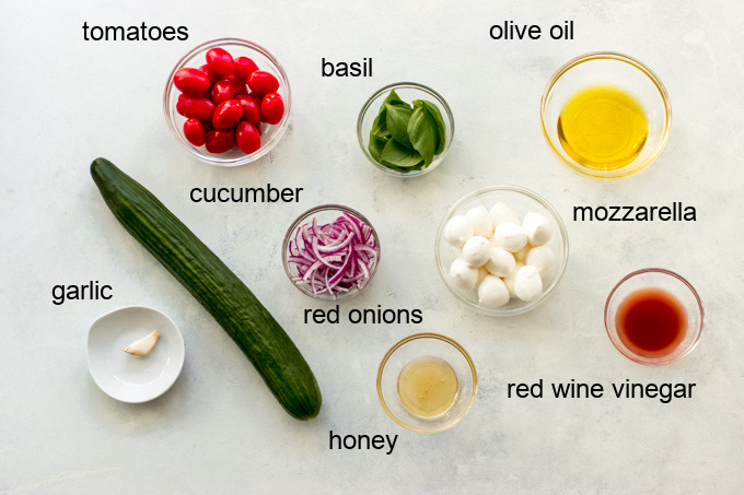 ingredients for cucumber tomato mozzarella basil salad
