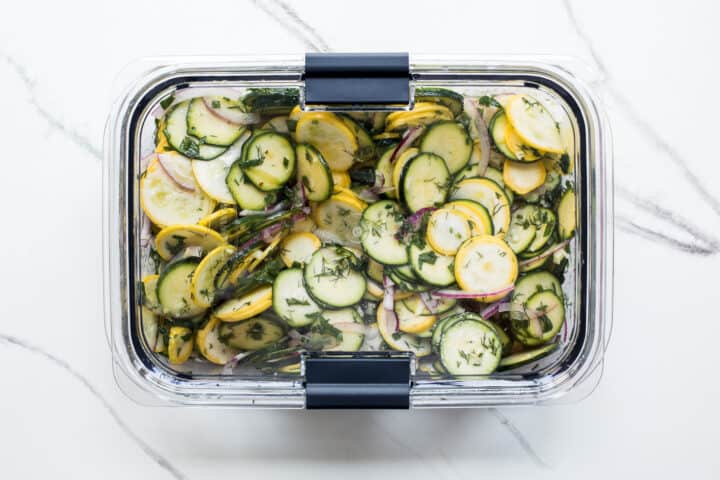 marinated squash salad in a tupperware