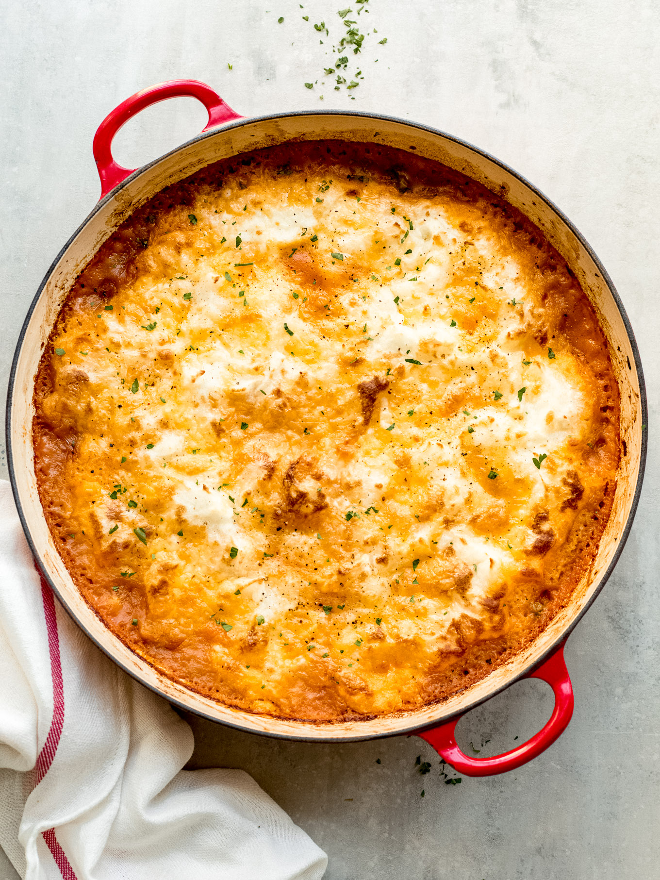 turkey shepherd's pie with ground turkey and corn in a saute pan.