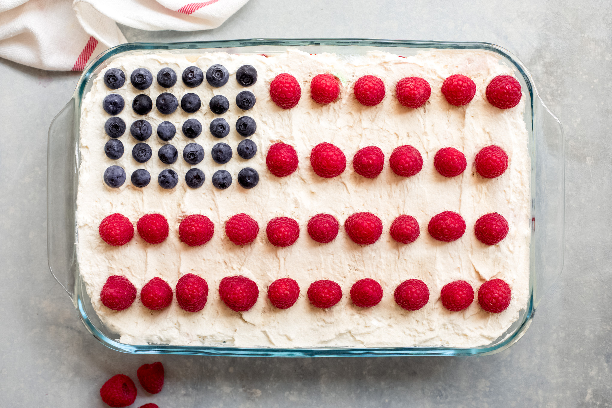 no bake American flag cake decorated with fresh berries.