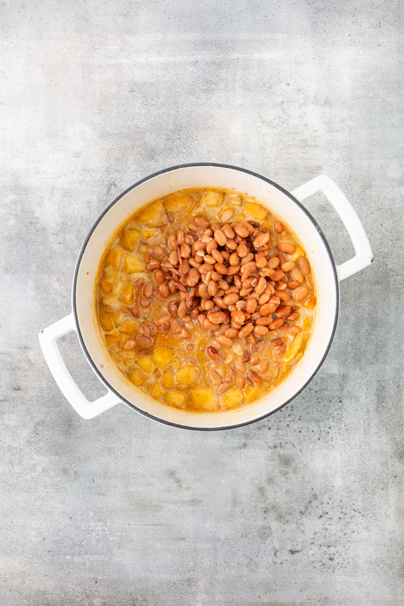 dutch oven with liquid and beans.