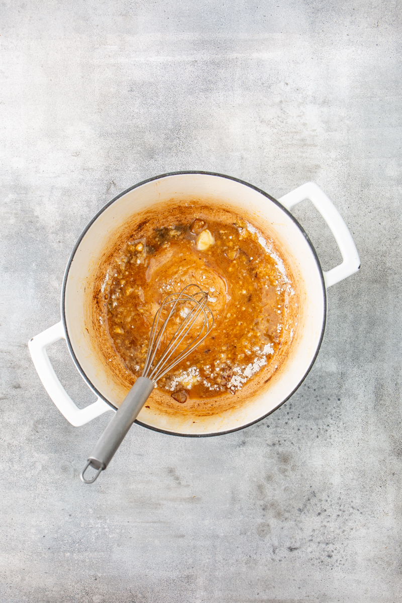 flour with butter in a dutch oven with a metal whisk.