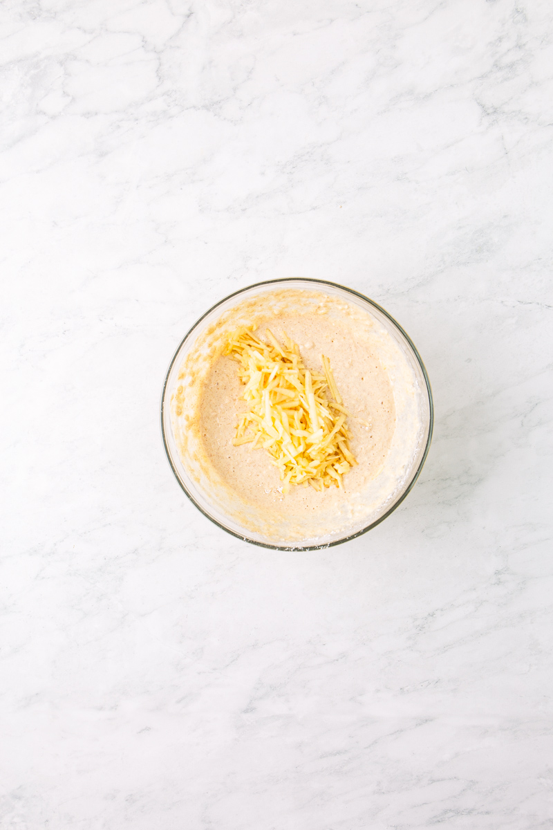 shredded apples in a pancakes batter.