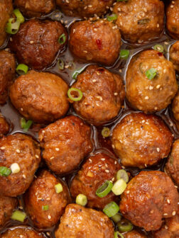 sweet and spicy meatballs in a crockpot.