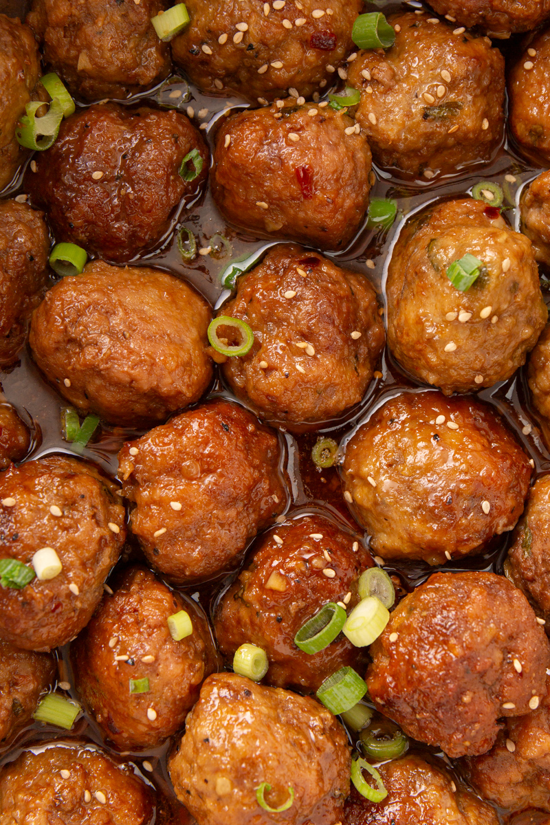 sweet and spicy meatballs in a crockpot.