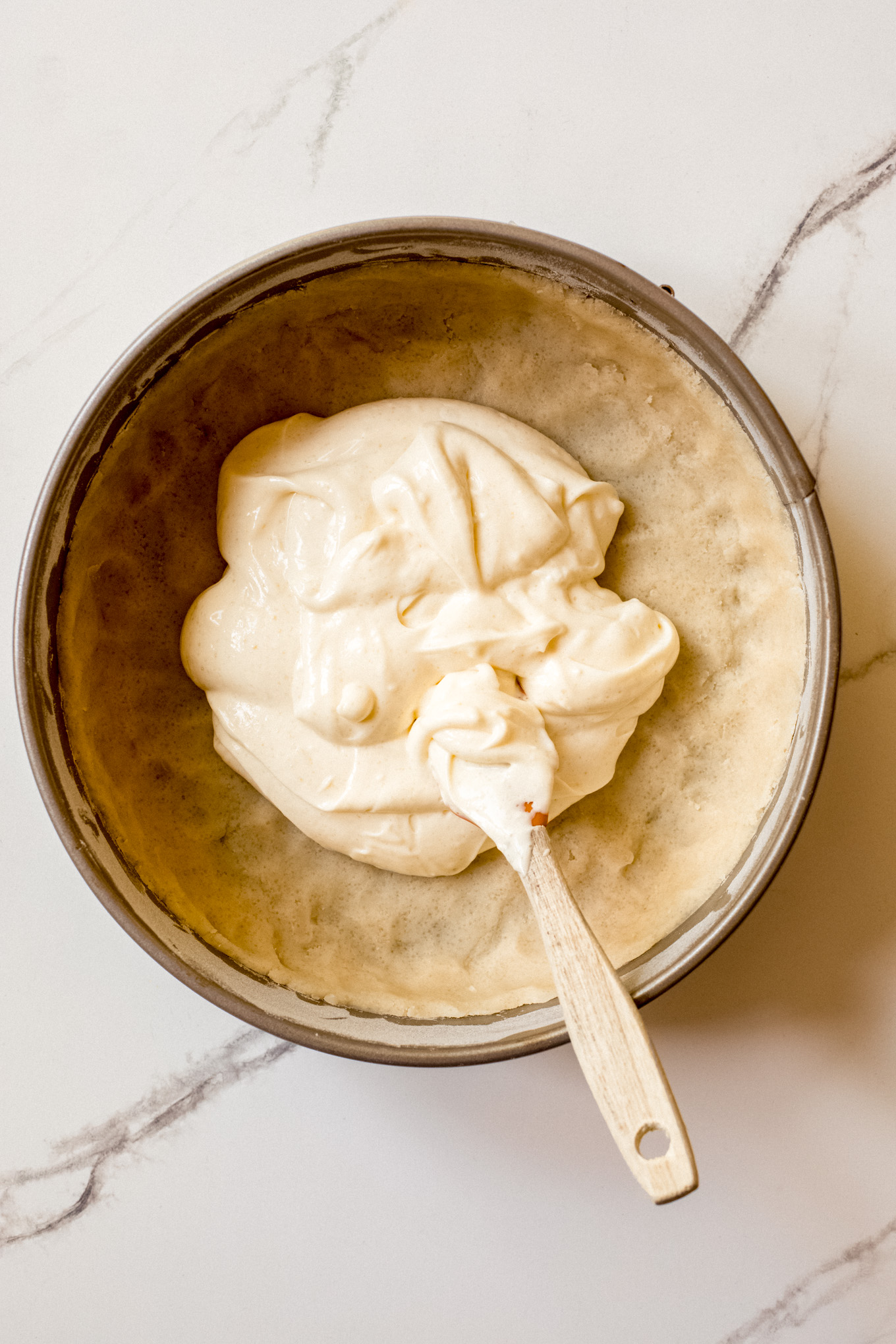 cream cheese filling in a springform pan.