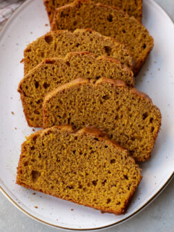 sliced pumpkin bread on a plate.