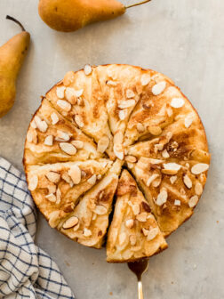 sliced pear cake with fresh pears.