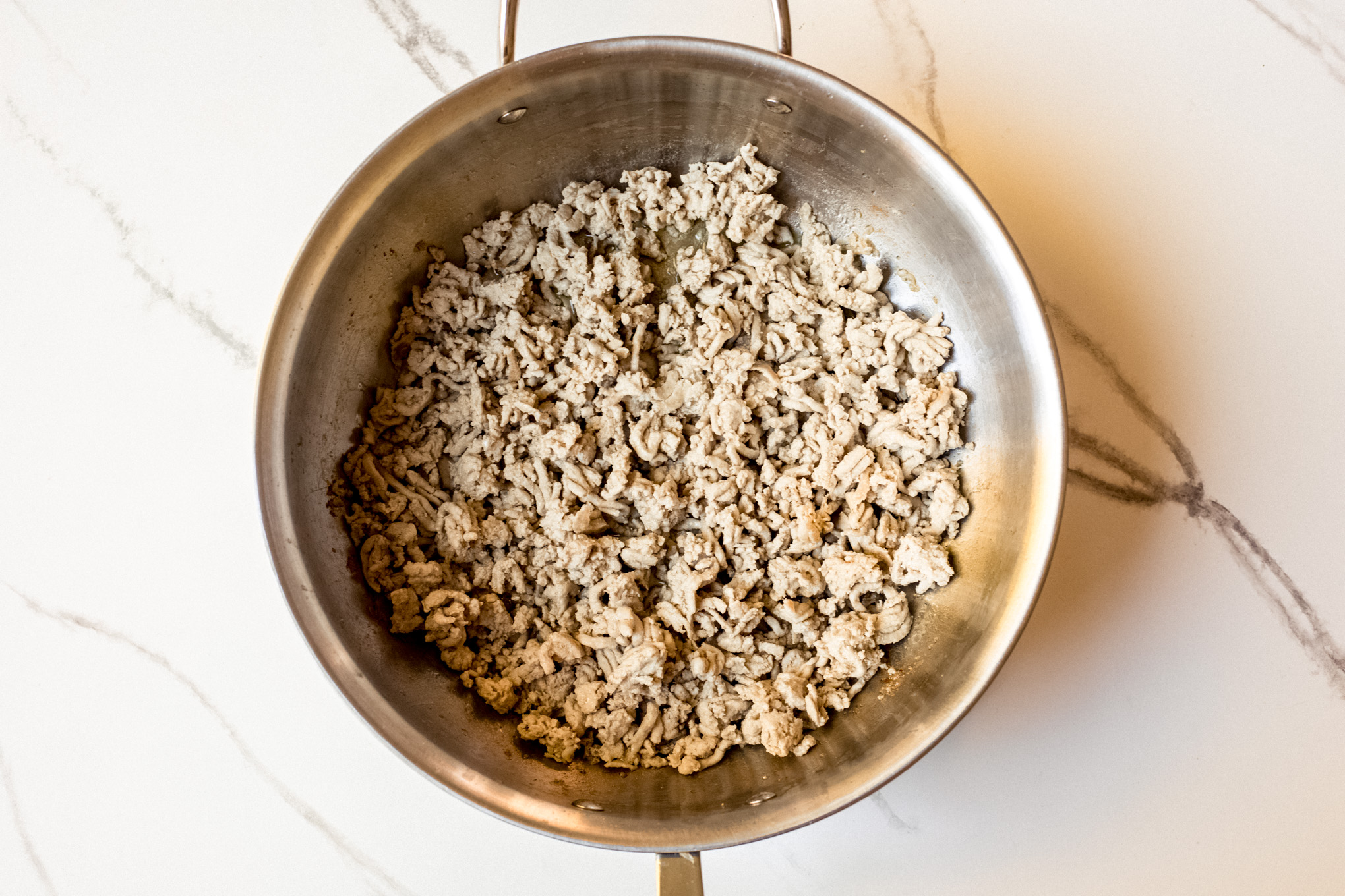 cooked ground turkey in a pot.