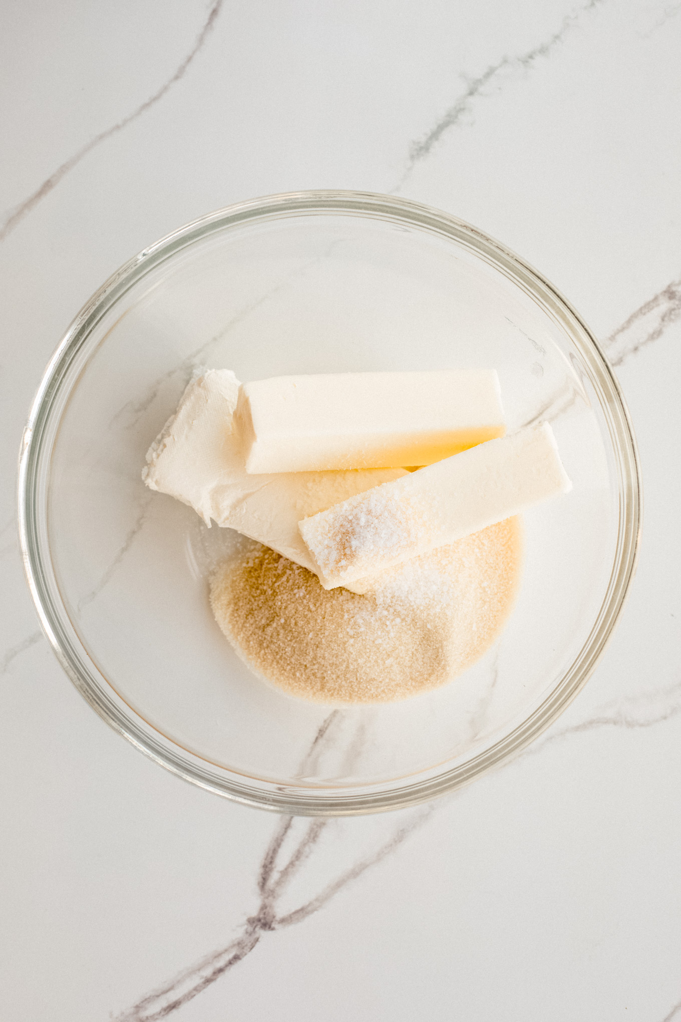 butter and sugar in a glass bowl.