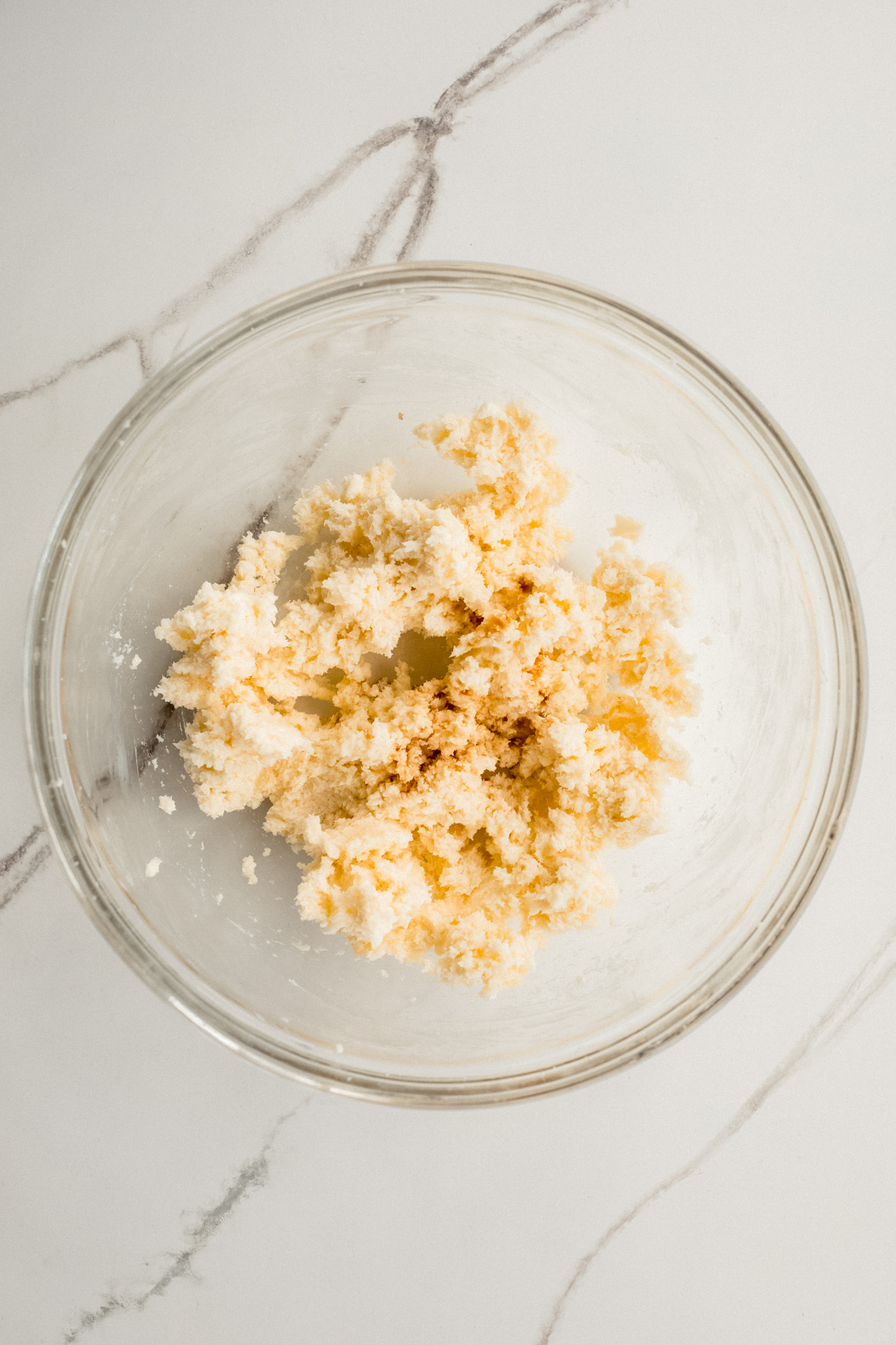 creamed butter and sugar in a glass bowl.