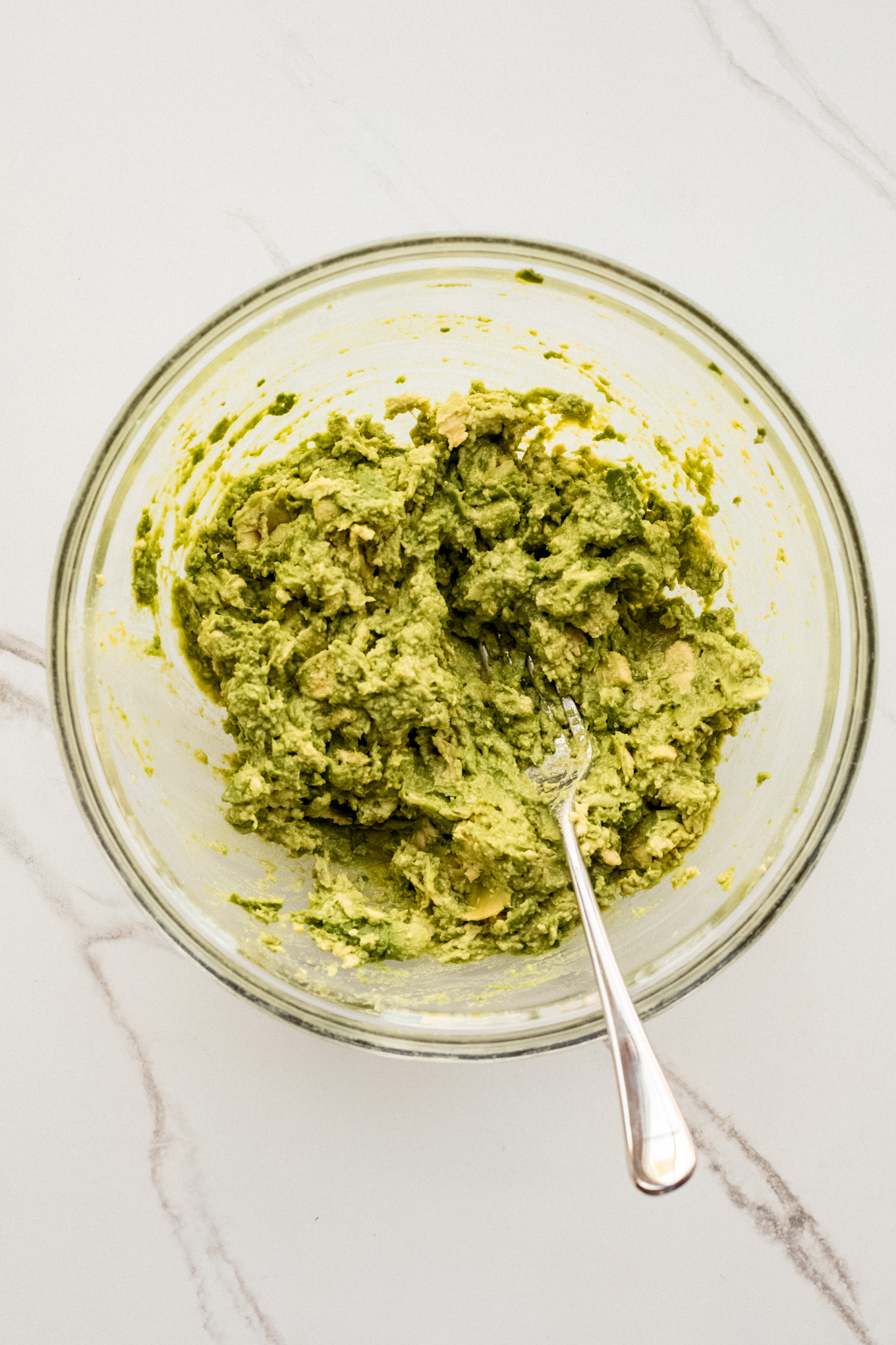 mashed avocados in a bowl.