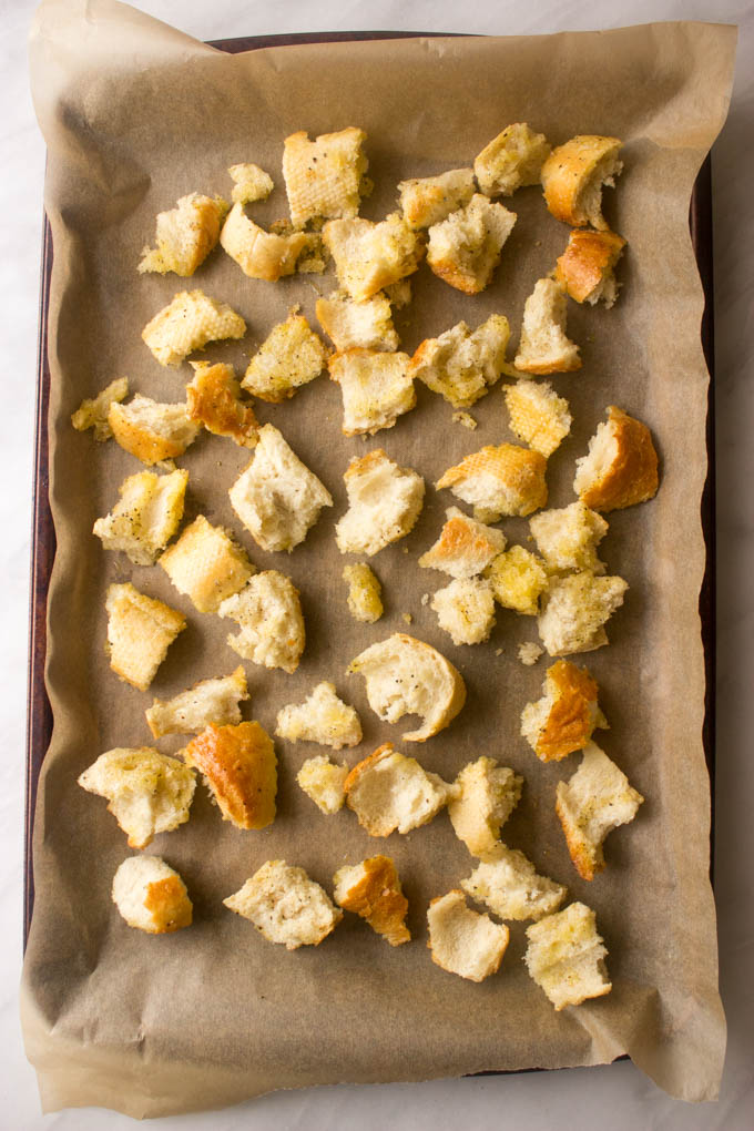croutons on a parchment lined baking sheet.
