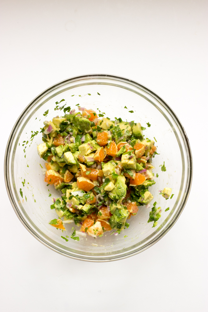 orange avocado salsa in a bowl.