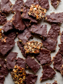 nut and seed bark spread on a parchment lined sheet pan.